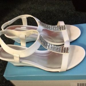 white wedge sandals. worn once- size7.5W.